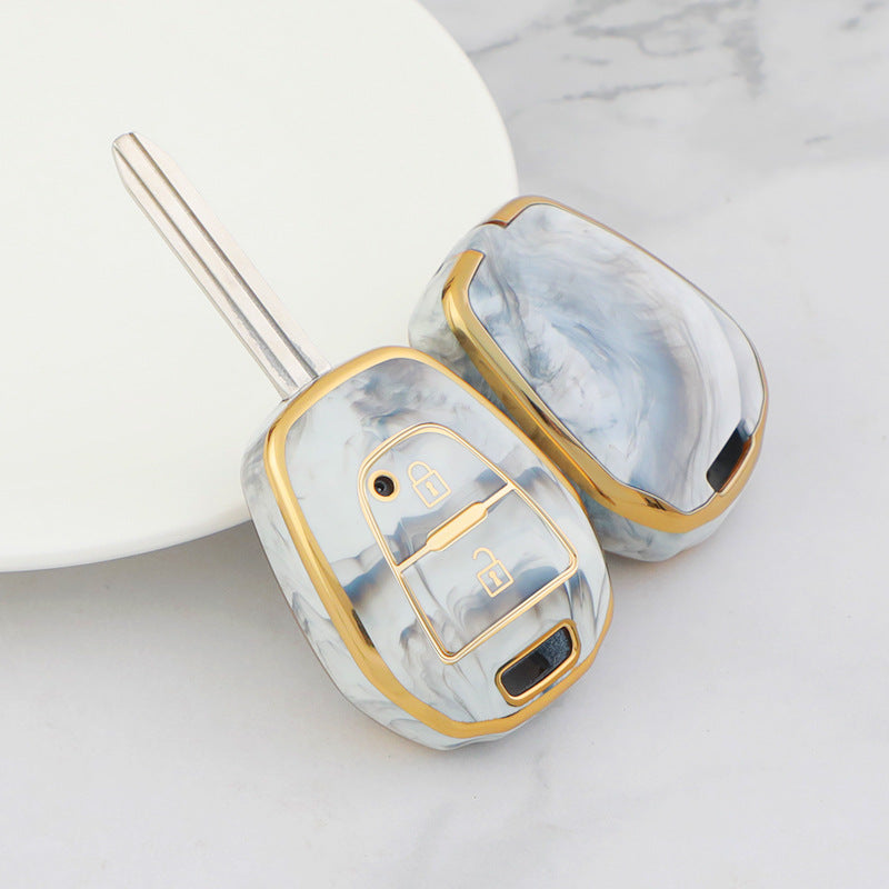 Isuzu Autoschlüsseletui, goldfarben mit Jade-Einlage